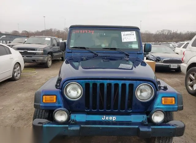 1J4FA49S34P763060 2004 2004 Jeep Wrangler- Sport 6