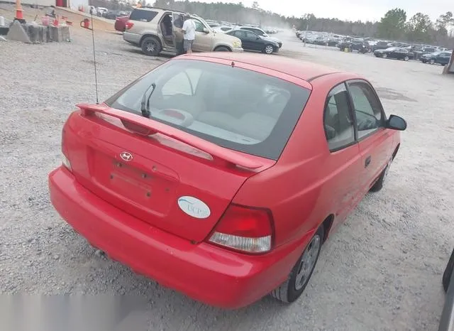 KMHCG35C32U157056 2002 2002 Hyundai Accent- GS 4