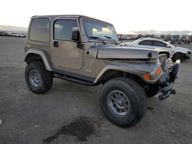 1J4FA59SX4P713813 2004 2004 Jeep Wrangler- Sahara 4