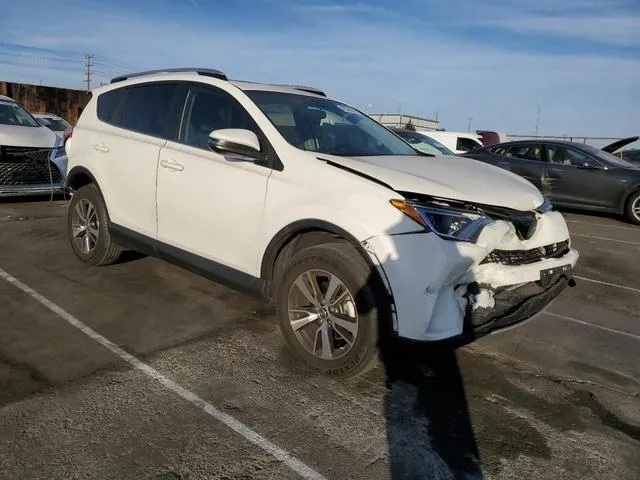 JTMWFREV4GJ083647 2016 2016 Toyota RAV4- Xle 4