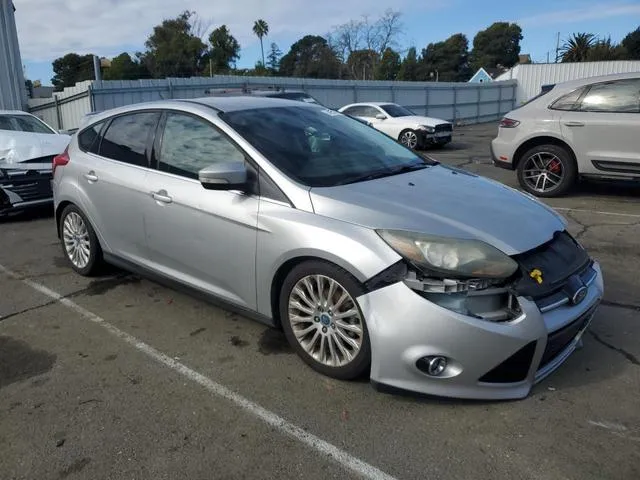 1FAHP3N20CL144957 2012 2012 Ford Focus- Titanium 4