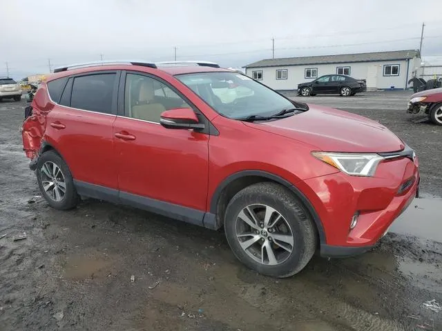 JTMRFREV0GJ077454 2016 2016 Toyota RAV4- Xle 4