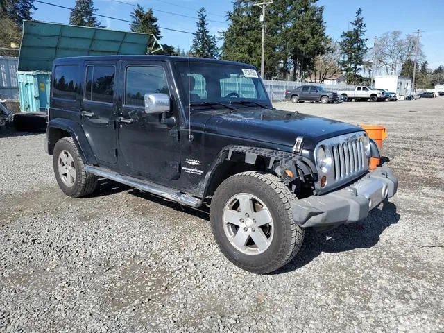 1J4HA5H19BL581424 2011 2011 Jeep Wrangler- Sahara 4