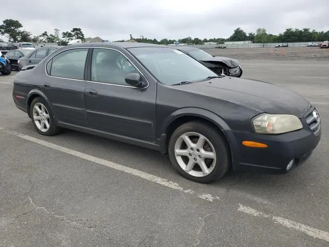 JN1DA31D22T444132 2002 2002 Nissan Maxima- Gle 4