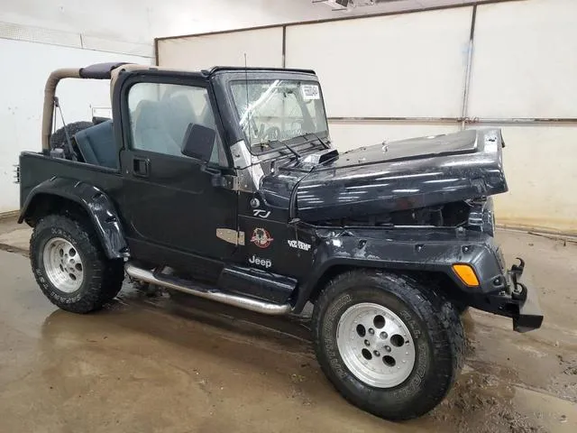 1J4FA59S82P706310 2002 2002 Jeep Wrangler- Sahara 4