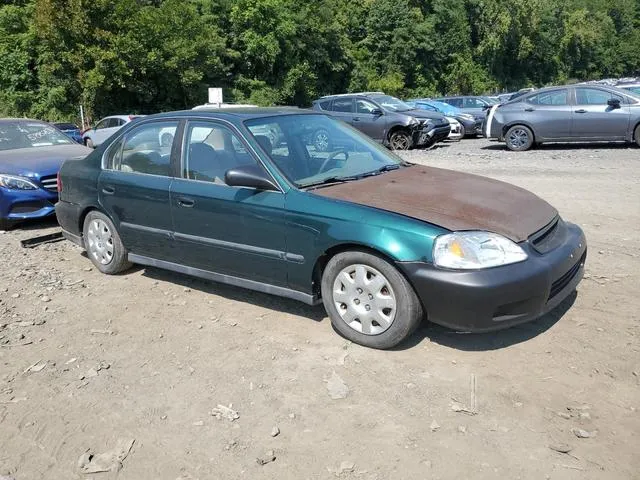 1HGEJ6675XL003562 1999 1999 Honda Civic- LX 4