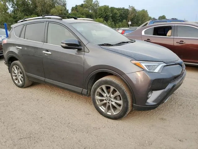 JTMDFREV5GJ056951 2016 2016 Toyota RAV4- Limited 4