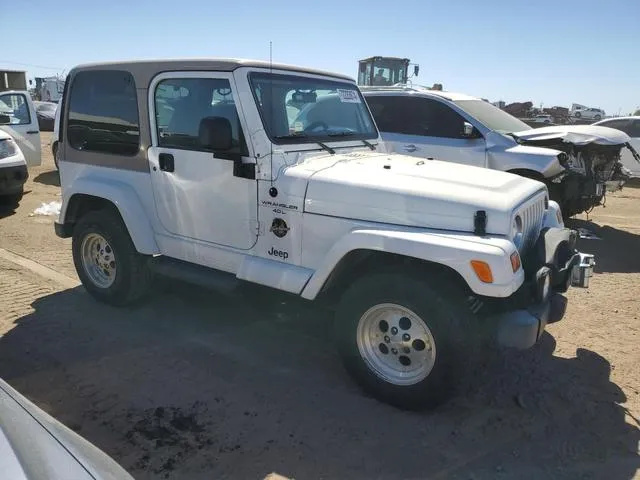 1J4FY49S3XP409877 1999 1999 Jeep Wrangler- Sahara 4