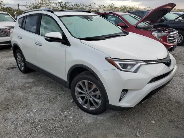 JTMDFREV4JJ257425 2018 2018 Toyota RAV4- Limited 4