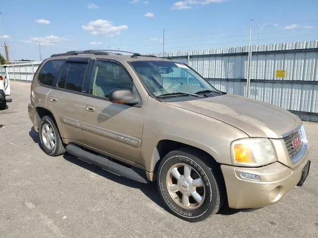 1GKDT13S742279439 2004 2004 GMC Envoy 4