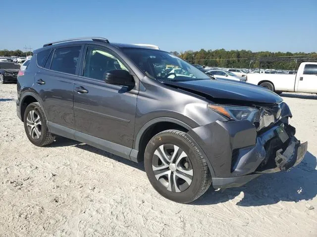 JTMBFREV0JJ196999 2018 2018 Toyota RAV4- LE 4