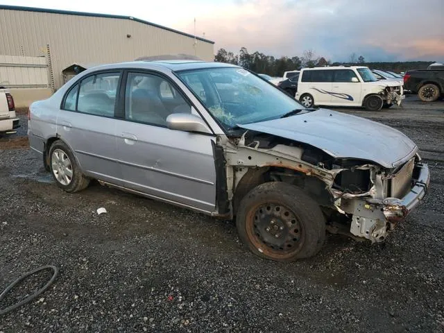 1HGES26702L051792 2002 2002 Honda Civic- EX 4