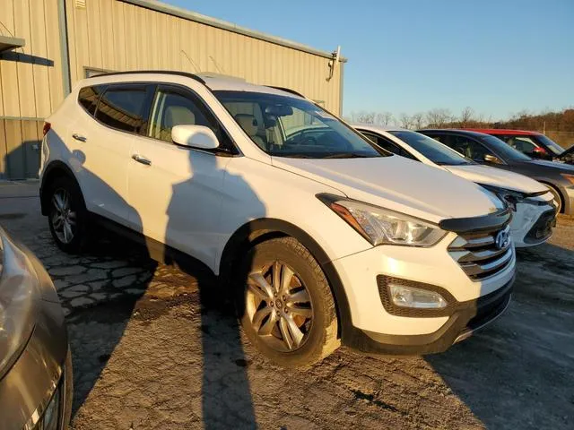 5XYZUDLA9DG060253 2013 2013 Hyundai Santa Fe 4