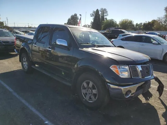 1N6AD07U25C461477 2005 2005 Nissan Frontier- Crew Cab Le 4