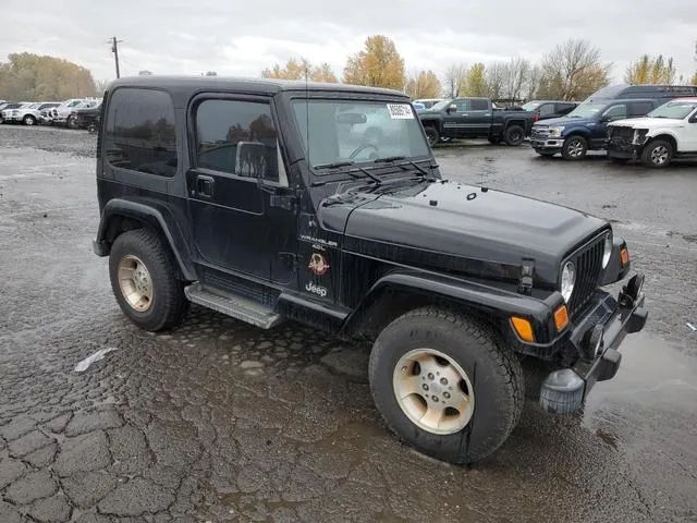 1J4FA59S21P310713 2001 2001 Jeep Wrangler- Sahara 4