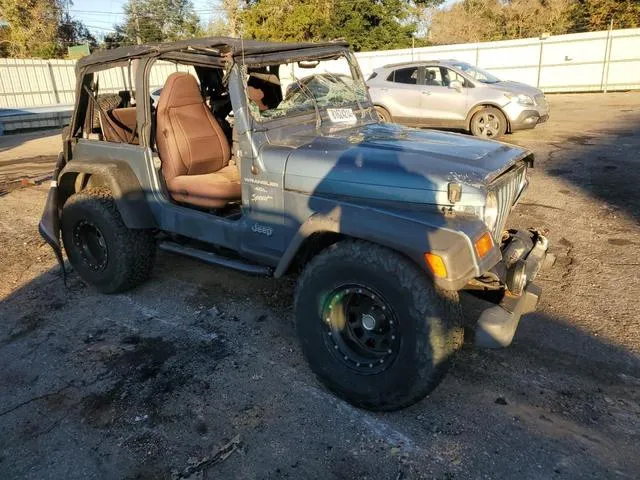 1J4FY19S5XP416036 1999 1999 Jeep Wrangler- Sport 4