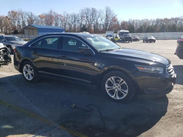 1FAHP2E89FG127599 2015 2015 Ford Taurus- Sel 4