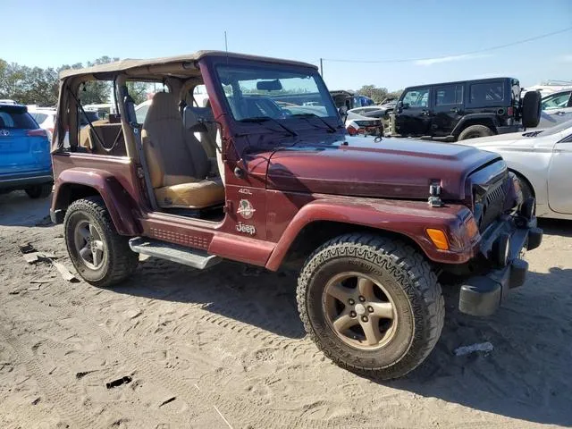 1J4FA59S61P335016 2001 2001 Jeep Wrangler- Sahara 4