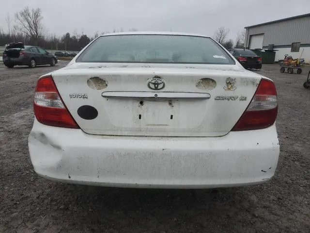 4T1BE32KX2U009676 2002 2002 Toyota Camry- LE 6