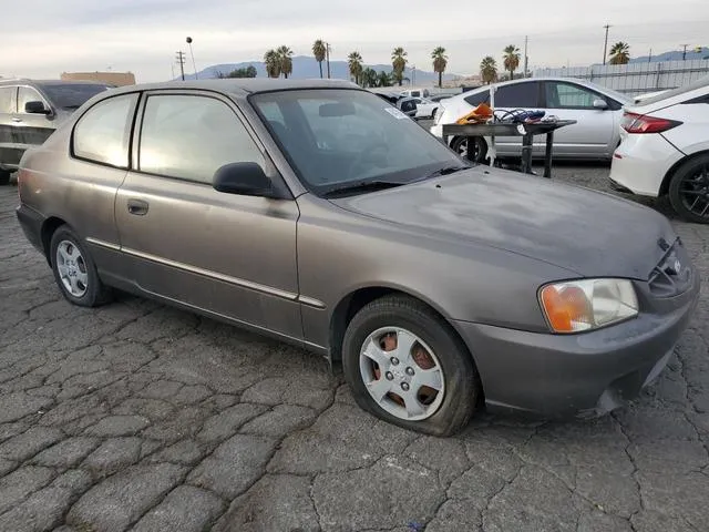 KMHCG35C81U141661 2001 2001 Hyundai Accent- GS 4