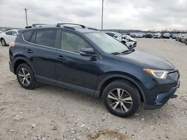 JTMWFREV0HD096203 2017 2017 Toyota RAV4- Xle 4