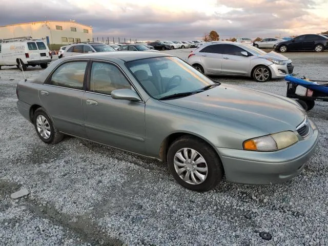 1YVGF22C1X5846046 1999 1999 Mazda 626- ES 4