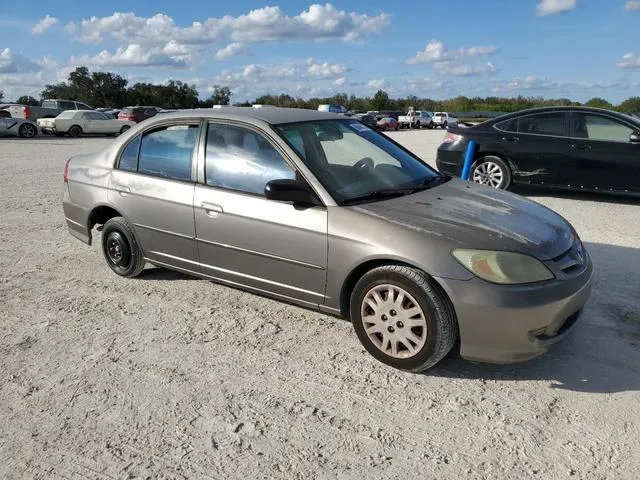 2HGES16584H581940 2004 2004 Honda Civic- LX 4