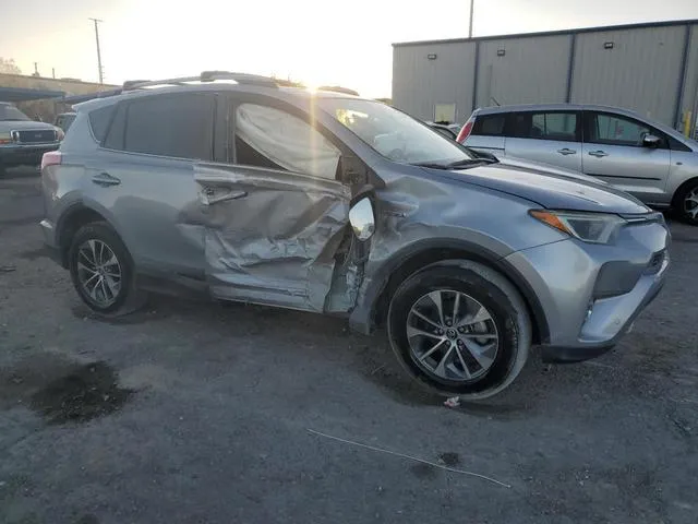 JTMRJREV6JD176672 2018 2018 Toyota RAV4- LE 4