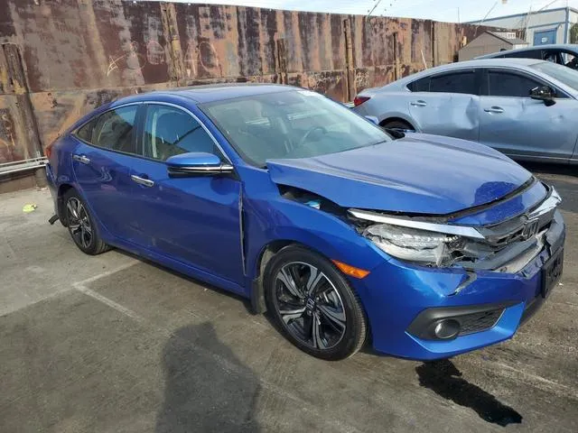 2HGFC1F98GH640056 2016 2016 Honda Civic- Touring 4