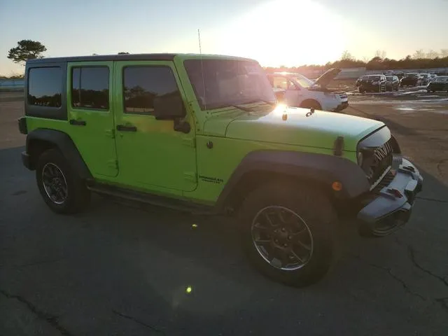 1C4HJWDG6CL240036 2012 2012 Jeep Wrangler- Sport 4